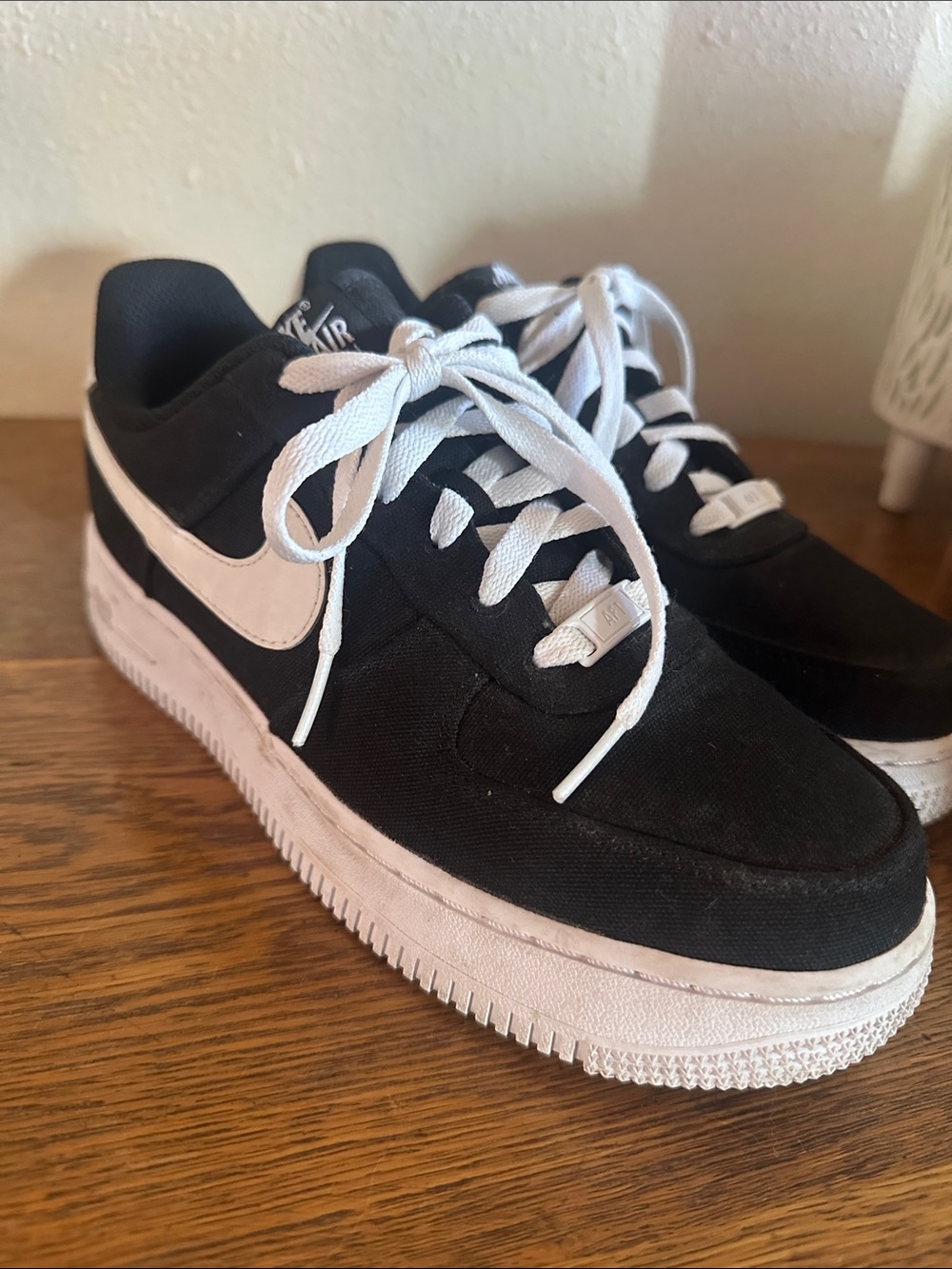 Nike woman’s Black and White Low-Top Air Force 1